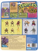 TEENAGE MUTANT NINJA TURTLES (1988) - FOOT SOLDIER SERIES 1/10 BACK ACTION FIGURE ON CARD.