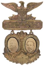 HARRISON & REID ORNATE BRASS SHELL JUGATE BADGE.