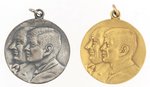 PAIR OF KENNEDY & JOHNSON JUGATE INAUGURATION CHARMS.