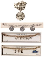 KENNEDY QUARTET OF CHARM BRACELETS INC. THREE ON ORIGINAL SALE CARDS.