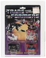 TRANSFORMERS (1985) SERIES 2 CASSETTES - RAVAGE & RUMBLE AFA 80 NM (W/RUBSIGN).