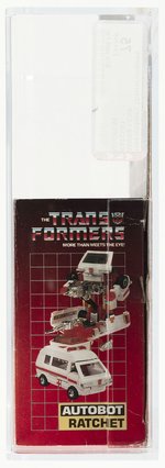 TRANSFORMERS (1984) SERIES 1 CAR - RATCHET AFA 75 EX+/NM (NO CROSS).