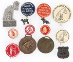 CHAMP CLARK "QUIT KICKING MY DOG AROUND" COLLECTION OF SLOGAN BUTTONS, FOBS & MORE.