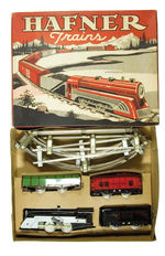 "HAFNER" BOXED WIND-UP TRAIN SET PAIR.