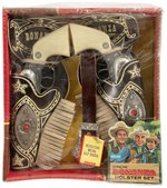 OFFICIAL BONANZA HOLSTER SET WITH METAL CAP PISTOLS IN BOX.