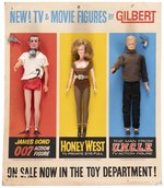 JAMES BOND, HONEY WEST AND MAN FROM U.N.C.L.E. (ILLYA) GILBERT DEPARTMENT TOY EASEL BACK DISPLAY.