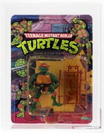 TEENAGE MUTANT NINJA TURTLES (1988) - MICHAELANGELO SERIES 1/10 BACK AFA 70 EX+.