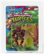 TEENAGE MUTANT NINJA TURTLES (1992) - RAHZAR SERIES 5/43 BACK AFA 80 Y-NM (BLACK NOSE).