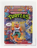 TEENAGE MUTANT NINJA TURTLES (1990) - TRICERATON SERIES 3/44 BACK AFA 85 NM+.