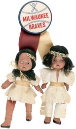 1950s MILWAUKEE BRAVES CROSSED BATS BUTTON WITH CELLO BOY AND GIRL DOLL ATTACHMENTS.