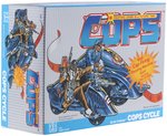 C.O.P.S.'N CROOKS COPS BLUE STREAK CYCLE IN BOX.