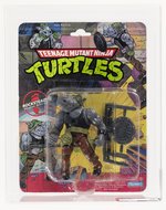 TEENAGE MUTANT NINJA TURTLES (1988) - ROCKSTEADY SERIES 1/10 BACK AFA 75 EX+/NM.