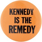 "KENNEDY IS THE REMEDY" RARE 1960 SLOGAN BUTTON.