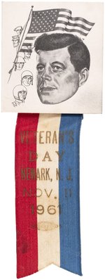 KENNEDY "VETERANS DAY NEWARK, NJ NOV. 11, 1961" SCARCE RIBBON BADGE.