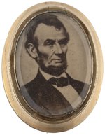 LINCOLN GOLD FILLED FRAMED ALBUMEN PORTRAIT UNDER GLASS BADGE.