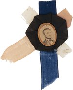 LINCOLN BRASS FRAMED ALBUMEN PORTRAIT BADGE ON MOURNING ROSETTE.