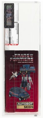 TRANSFORMERS (1985) SERIES 2 CAR - SKIDS AFA 70+ EX+.