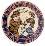 WWI C. 1915 BUTTON SHOWS  AUSSIE SOLDIER PUNCHING KAISER WILHELM IN THE MOUTH WITH RIM TEXT "EAT THAT".