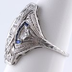 18KT WHITE GOLD ART DECO DIAMOND AND SAPPHIRE RING.