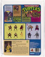 TEENAGE MUTANT NINJA TURTLES (1988) - APRIL O'NEIL SERIES 1/10 BACK AFA 75 EX+/NM (ORANGE STRIPES/PRESS).