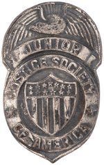 THE JUNIOR JUSTICE SOCIETY OF AMERICA COMPLETE FINAL VERSION CLUB KIT WITH BADGE.