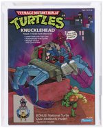 TEENAGE MUTANT NINJA TURTLES (1988) - KNUCKLEHEAD SERIES 1 VEHICLE AFA 80+ NM.