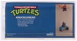 TEENAGE MUTANT NINJA TURTLES (1988) - KNUCKLEHEAD SERIES 1 VEHICLE AFA 80+ NM.