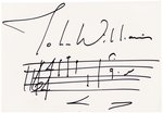 CLOSE ENCOUNTERS OF THE THIRD KIND COMPOSER JOHN WILLIAMS SIGNED MUSICAL SCORE.