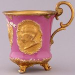 WASHINGTON & FRANKLIN ORNATE MEISSEN FOOTED CUP & SAUCER.
