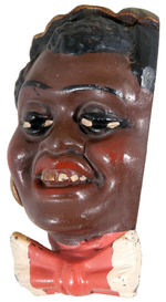 BLACK FIGURAL CHARACTER TERRA COTTA BANK.