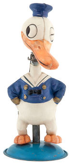 DONALD DUCK CELLULOID NODDER WIND-UP.