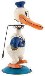 DONALD DUCK CELLULOID NODDER WIND-UP.