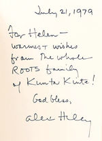 ALEX HALEY AUTOGRAPHED COPY OF 'ROOTS' WITH INSCRIPTION.