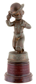 "KAYO" METAL STATUE WITH PLASTIC DICE GAME BASE.