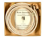 "TOM MIX RODEO ROPE" BOXED WITH INSTRUCTIONS AND SPINNING WEIGHT.