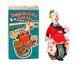 "SKIPPY THE TRICKY CYCLIST" BOXED WIND-UP.