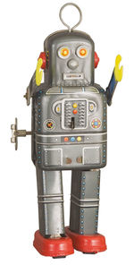 MECHANICAL WALKING SPACEMAN WIND-UP ROBOT.