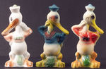 TRIO OF LONG-BILLED DONALD DUCK PAINTED PLASTER STATUES.