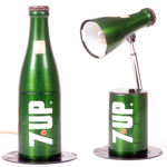 "7UP" FIGURAL DESK LAMP.