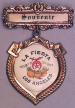 LARGE 1907 "FIESTA LOS ANGELES" BADGE.