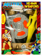 “MASTER OF THE UNIVERSE HE-MAN WEAPON” LARGE BOXED SET.