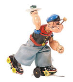 "ROLLER SKATER POPEYE" BOXED LINEMAR WIND-UP TOY.