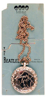 “THE BEATLES” BEAUTIFULLY MADE LARGE CELLULOID BRASS PENDANT ON CHAIN.