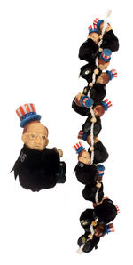 GEORGE BUSH FIGURES ON ROPE.