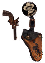 "TOM MIX CIRCUS" BUTTON W/LEATHER HOLSTER AND CAP GUN.