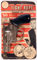 "TIGHT ROPE" CAP GUN.