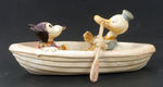 MICKEY MOUSE/DONALD DUCK IN ROWBOAT CELLULOID TOY.