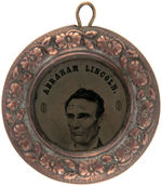 DeWITT & HAKE UNLISTED LINCOLN PORTRAIT LARGEST DOUGHNUT FERROTYPE WITH LOOP INTACT.