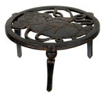 BONZO CAST IRON TRIVET.