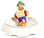 "HOHNER" MUSICAL INSTRUMENT CO. FIGURAL ASHTRAY.
